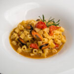 Tubettone pasta with mussels, black garlic and cherry tomatoes