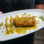 Mortadella and stracciatella rolls with pistachio sauce