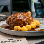 Pork shank with beer and potatoes