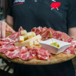 Selection of cured meats and cheeses